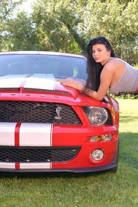 Lucy Li Posing With Red Car And Huge Boobs  04